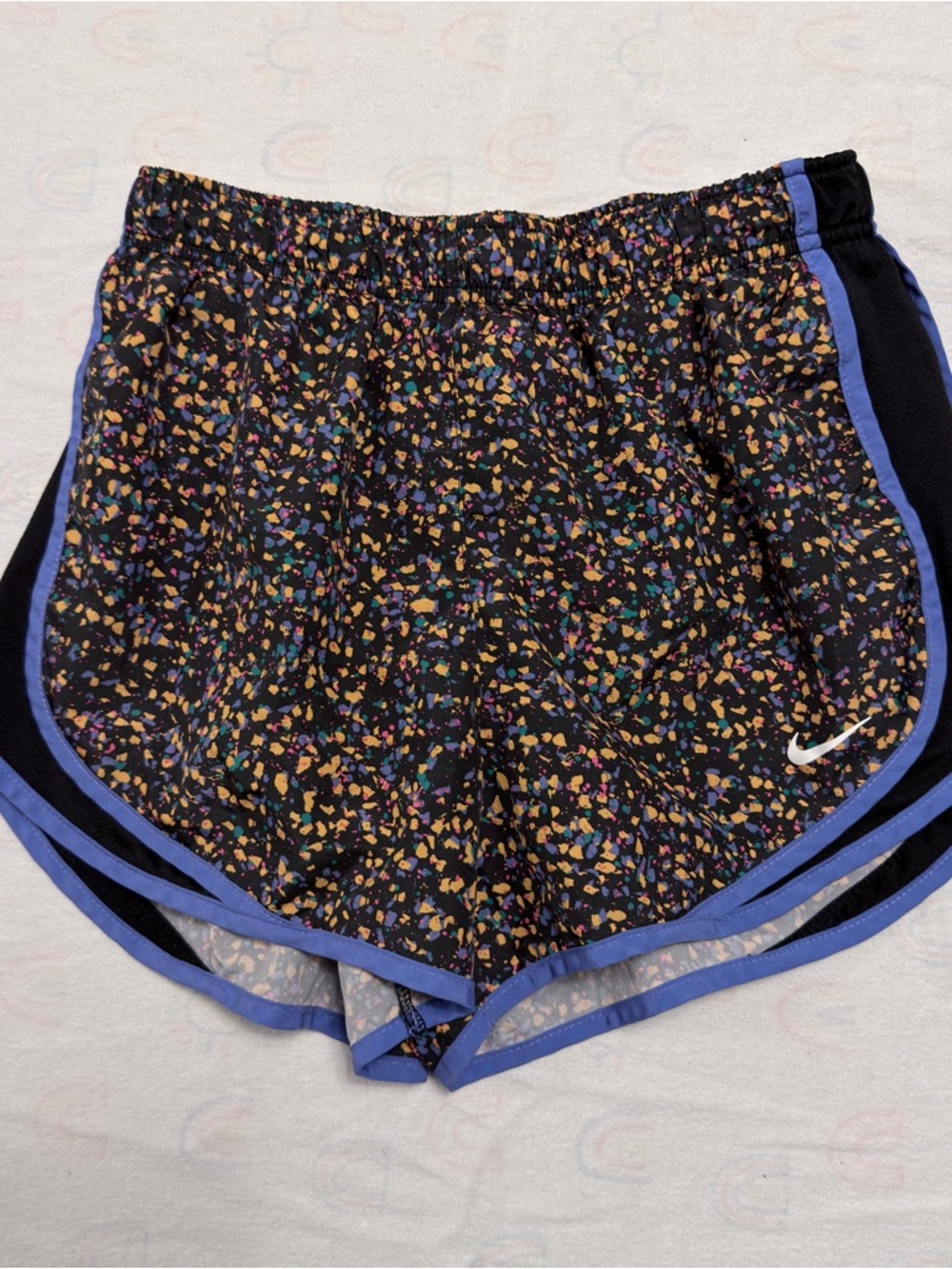 Nike Women's Black Confetti Athletic Shorts with Purple Trim